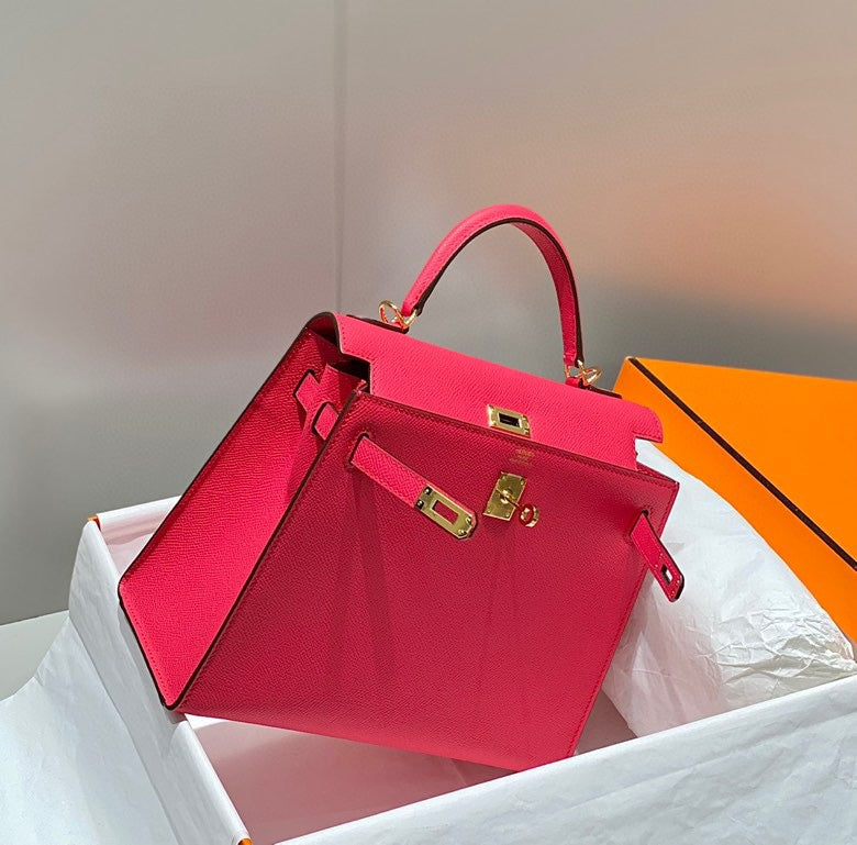 KELLY 25CM IN ROSE TYRIEN SWIFT CALFSKIN GOLD HARDWARE